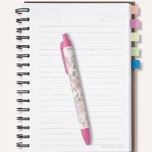 Stylo Noir Fleurs pastel sur l'arrière - plan rose clair