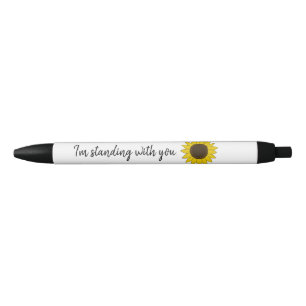 Stylo Noir Tournesol avec je suis debout avec vous Citation