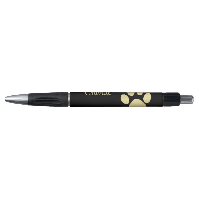 Stylo Paw chien brillant or sur arrière - plan noir (Devant)