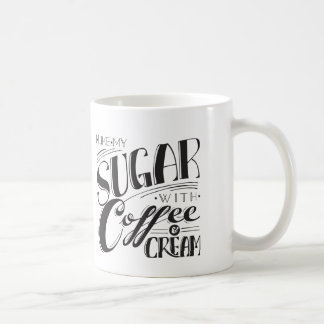 Sucre avec la tasse de café et de crème