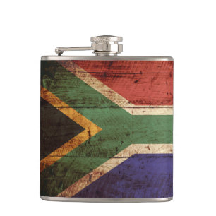 Südafrika-Flagge auf altem hölzernem Korn Flachmann
