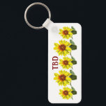 Sunflower Keychain Schlüsselanhänger<br><div class="desc">Display a natural vibe with this abundance of amber sunflowers keychain. This design has a warm feel due to its amber and orange palette. Express yourself by experimenting with different background colors and added text.</div>
