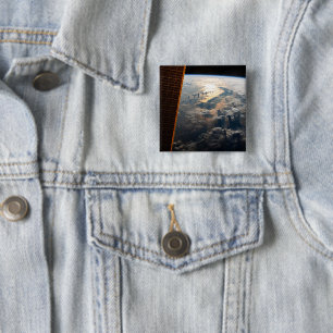 Sunglint blickt vor Celebes Meer in Südostasien Button