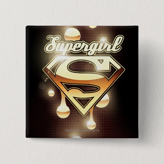 Supergirl Gold Tropfen Button (Vorderseite)