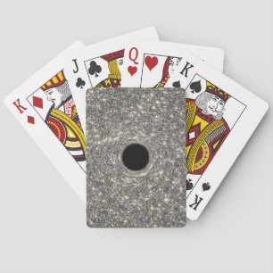 Supermassives schwarzes Loch in der Mitte einer Ga Spielkarten