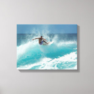 Surfer auf einem großen Wellen-Leinwanddruck Leinwanddruck