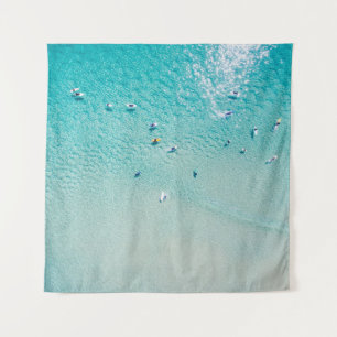 Surfer aus der Luft, klare Ozeane. Wandteppich