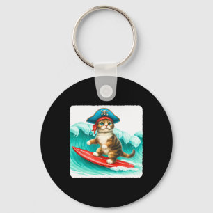 Surfkater mit Piratenhut auf Surfboard. Wellen Pl Schlüsselanhänger