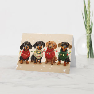 Süße Black and Tan Dachshunde Weihnachten