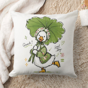 Süße Ente mit Blattregenschirm und floraler Haube Kissen