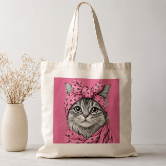 Süße getigerte Katze in retro rosafarbenem Punkte- Tragetasche