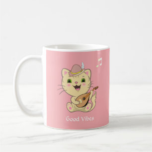 Süße glückliche musikalische rote getigerte Katze Kaffeetasse