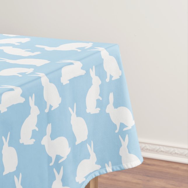 Süße Kaninchensilhouetten auf blauem Ostermuster Tischdecke (Beispiel)