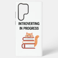 Süße Katze auf Büchern "Introvertierter in Ausbild
