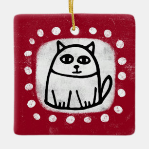 Süße Katze auf rotem Ornament