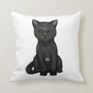 Süße schwarze Miezekatze-Katze mit hellen golden Kissen