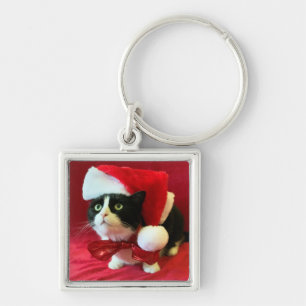 Süße Tuxedo-Katze mit Weihnachtsmannmütze Schlüsselanhänger