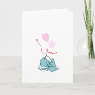 Süße Valentinskarte mit sitzendem Paar & Herzen Karte