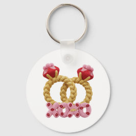 Süße verflochtene gestrickte Hochzeitsringe mit Ro Schlüsselanhänger