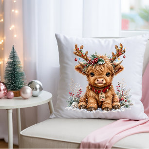 Süße Weihnachts-Hochlandkuh mit festlichen Geweihe Kissen