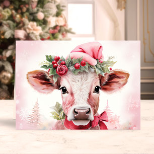 Süße Weihnachtskuh mit Santa-Hut Feiertagskarte