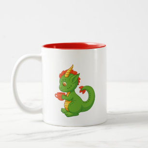 Süßer Baby-Drache hält Zwei-Töne-Tasse Zweifarbige Tasse