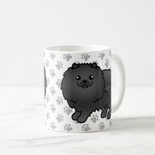 Süßer Cartoon-Hund und Pfoten eines schwarzen Pome Kaffeetasse