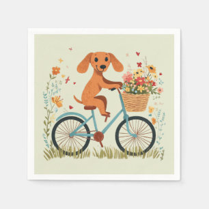 Süßer Dachshund Hund beim Radfahren mit Frühlingsb Serviette
