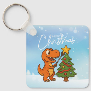 Süßer Dinosaurier mit Weihnachtsbaum Schlüsselanhänger