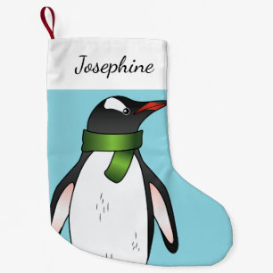 Süßer Gentoo-Pinguin mit grünem Schal auf Blau Kleiner Weihnachtsstrumpf