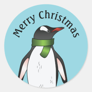 Süßer Gentoo-Pinguin mit grünem Schal auf Blau Runder Aufkleber