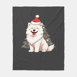 Süßer Hund mit Weihnachtsmannmütze und Weihnachtsb Fleecedecke
