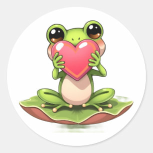 Süßer kleiner Frosch hält ein Herz Runder Aufkleber