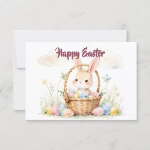 Süßer Osterhase im Korb mit farbenfrohen Eiern