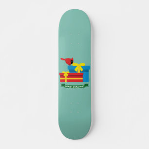 Süßer roter Kardinal öffnet ein blaues Geschenk Skateboard