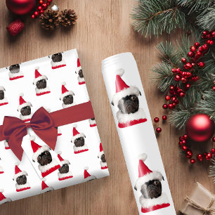 Süßer schwarzer Mops mit Weihnachtsmannmütze zu We Geschenkpapier