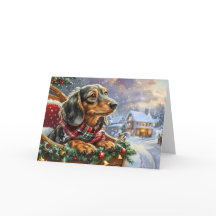 Süßer schwarzer und brauner Dachshund Weihnachten