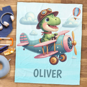 Süßer Trex-Dinosaur fliegt ein charmantes Flugzeug Fleecedecke
