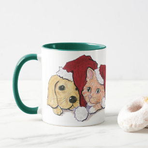 Süßer Weihnachts-Labrador-Welpe und orange getiger Tasse