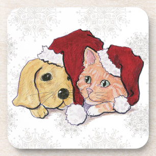 Süßer Weihnachts-Labrador-Welpe und orangefarbener Untersetzer