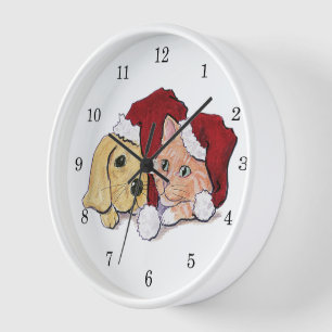 Süßer Weihnachts-Labrador-Welpe und orangefarbener Wanduhr