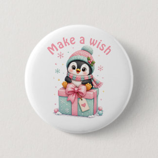 Süßer Weihnachts-Pinguin sitzt auf einer Geschenks Button