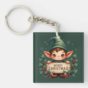 Süßer Weihnachtself hält fröhliches Schild in Grün Schlüsselanhänger