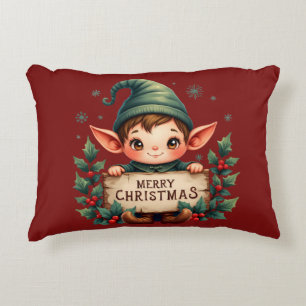 Süßer Weihnachtself hält fröhliches Schild Rot Dekokissen