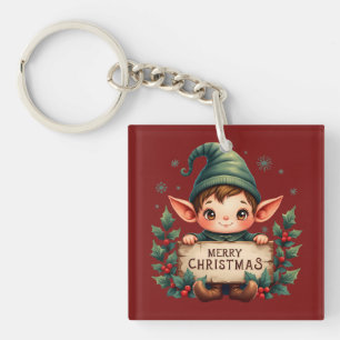 Süßer Weihnachtself hält fröhliches Schild Rot Schlüsselanhänger