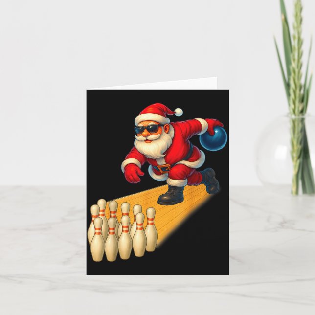 Süßer Weihnachtsmann spielt Bowlingkugel und Ns Bo Karte (Vorderseite)