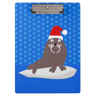Süßer Weihnachtswalross und Schneeflocken Klemmbrett