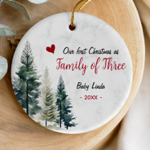 Süßes erstes Weihnachten als Familie zu Dritt rote