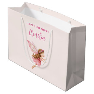 Süßes Feenmädchen in einem rosa Kleid Fantasievoll Große Geschenktüte