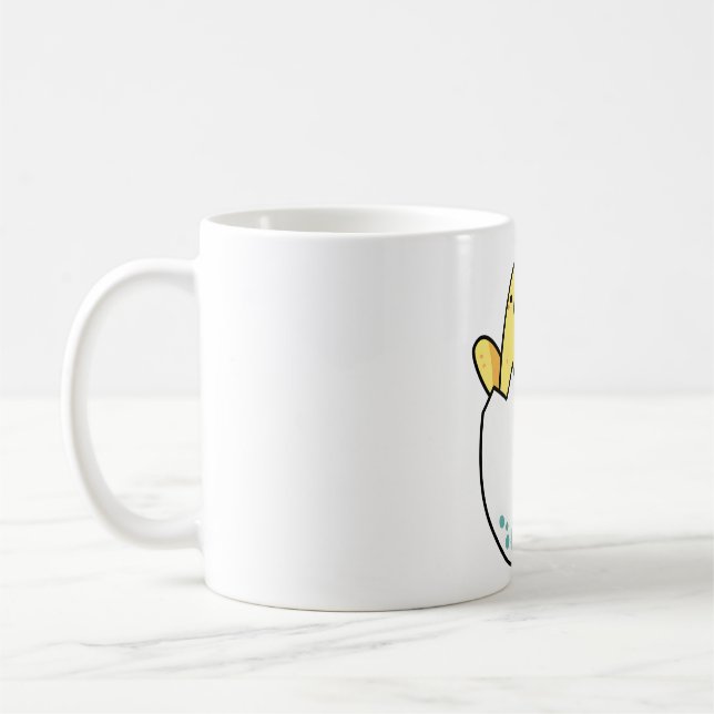 Süßes gelbes Küken im Ei Kaffeetasse (Links)